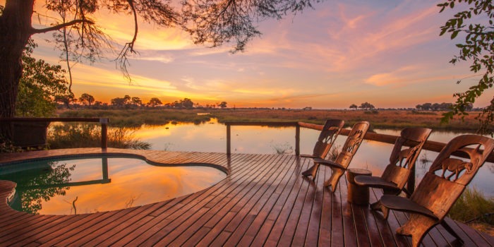 kwando lagoon camp pool sunset