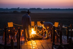 west zambia kafue Busanga Plains Camp sunset fire place