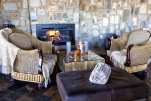 7Etosha Mountain Lodge Main area sofas fireplace