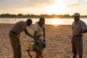 kasikizi camp zambia drinks sunset